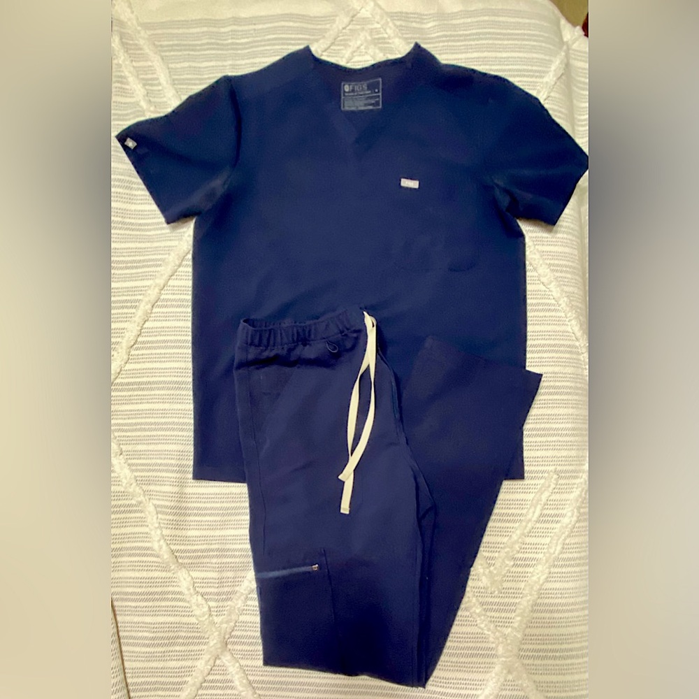 Cargo pants size medium tall. Top size medium.